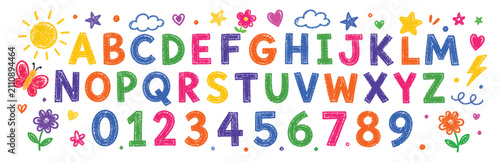Set of colorful hand-drawn alphabet letters and numbers with cute doodle elements like sun, flowers, hearts, and stars isolated on white background.