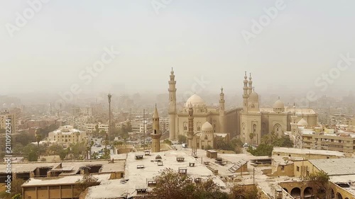 Dust storm in central Cairo. Sultan Hassan Mosque, Al-Rifai Mosque in Cairo, Egypt