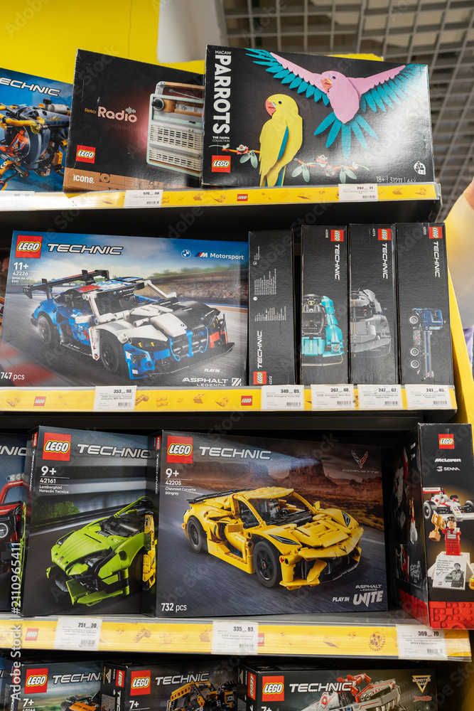 Fototapeta premium Lego products on a shelf in a shop. Boxes of Lego sets displayed on supermarket shelves. Minsk, Belarus - June 10, 2026