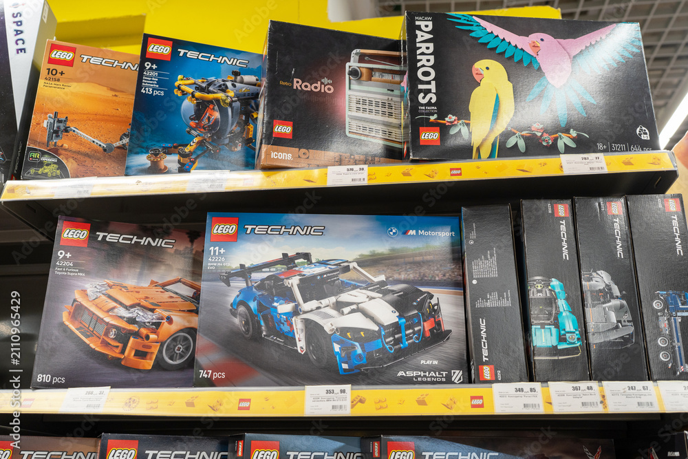 Fototapeta premium Lego products on a shelf in a shop. Boxes of Lego sets displayed on supermarket shelves. Minsk, Belarus - June 10, 2026