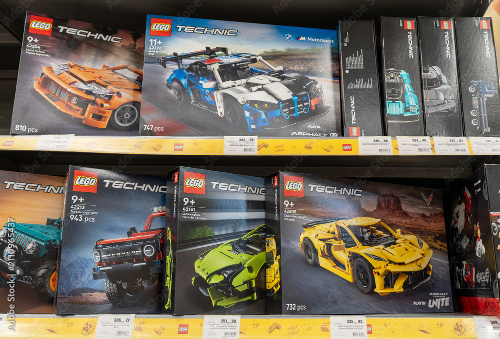 Fototapeta premium Lego products on a shelf in a shop. Boxes of Lego sets displayed on supermarket shelves. Minsk, Belarus - June 10, 2026