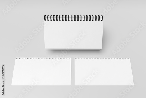 Desk calendar mockup set with standing blank horizontal table calendar and two loose paper sheets, flip binder template on grey background, top view presentation, 3d render