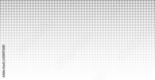 Rectangular halftone dot pattern with a vertical gradient transition from dense black dots to light fading on a white background surface