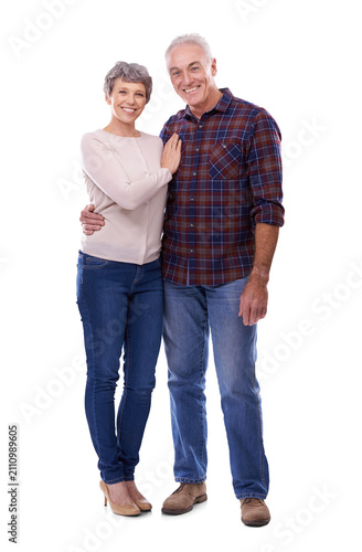 Happy senior couple, portrait and hug in retirement together isolated on a transparent PNG background. Mature or elderly man and woman smile in casual fashion, pension or embrace for old relationship