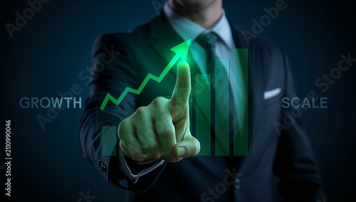 Business Growth Concept, Man Pointing at Rising Bar Chart, financial success and corporate development strategy