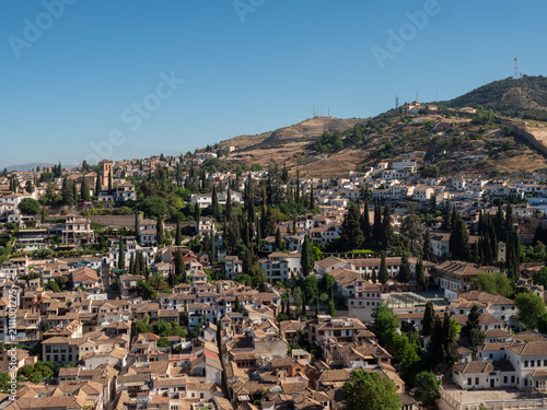 Panoramic view of Granada Spain with historic red-roof cityscape