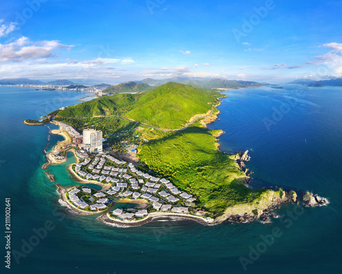 Photography Aerial panoramic view of a stunning construction project alongside the coastline in Nha Trang, Khanh Hoa, Vietnam