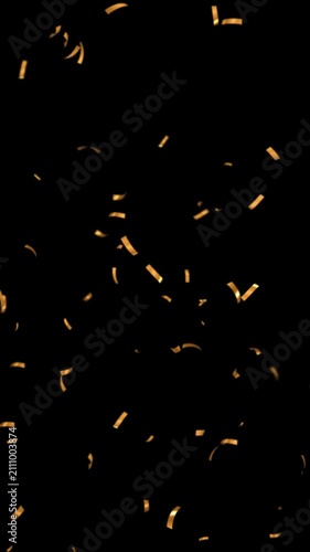 Gold confetti particle animation. Mobile-friendly. Perfect for Reels, Stories, and all social media platforms. Vertical video with transparent alpha channel ProRes 4444.