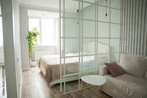 Canvastavla Modern bedroom with elegant divider and minimalist decor in a vacation rental