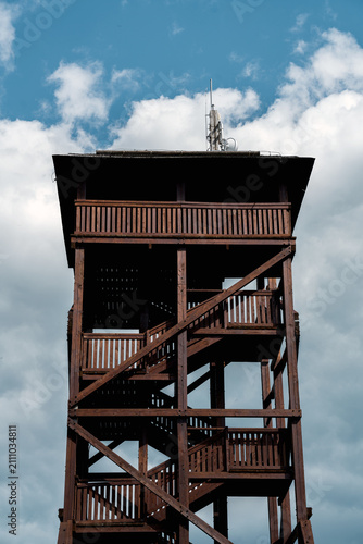 View of the observation tower on Dzikowiec Mountain from the upper station of the chairlift in Boguszów-Gorce, Poland.