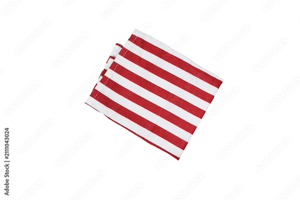 Fototapeta premium Red and White Striped Cotton Napkin Folded on White Background for Kitchen and Table Decor