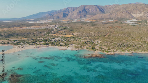 Fotografie Aerial panorama of Elafonisi beach lagoon with clear turquoise sea water and mou