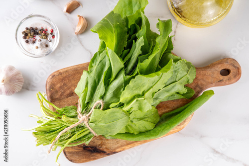 фотографія Bunch of fresh raw organic sorrel leaves