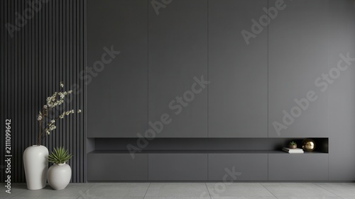 Minimalist interior with dark grey wall panels and plants. Home design.