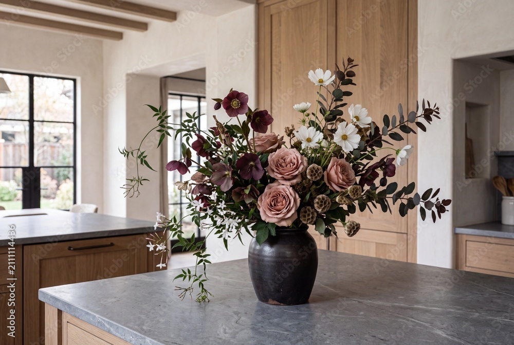Fototapeta premium Modern Farmhouse Kitchen Island with Floral Vase Centerpiece