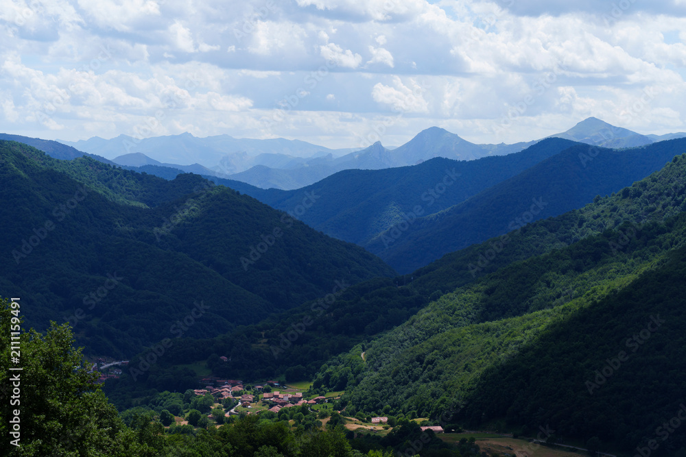 Fototapeta premium Pido Village in Summer with Sunshine and Mountains, Cantabria, Spain