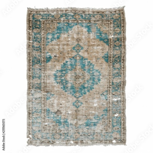 Faded vintage Anatolian rug with distressed teal blue medallion and aged beige ornate border pattern.