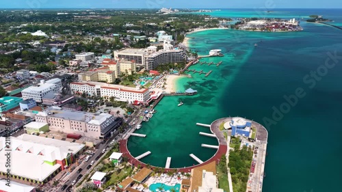 Nassau, Bahamas: Aerial view of turquoise sea, white sand beach and coastal road on New Providence island - landscape panorama of the Caribbean from above
