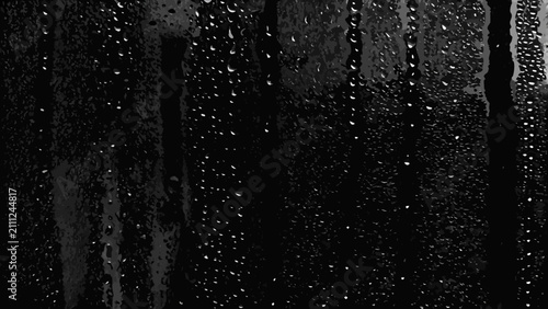 Bild auf Leinwand Water Droplets On Glass A Monochromatic Photo Featuring Streaks And Scattered Co