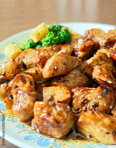 Japanese-style diced pork steak with onsen egg.