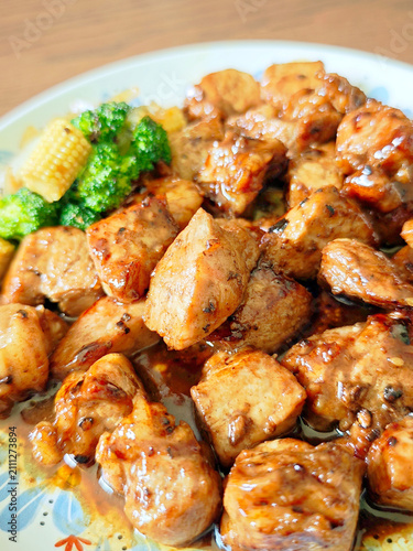 Japanese-style diced pork steak with onsen egg.
