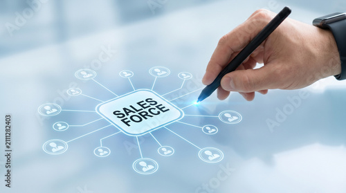 Professional hand using a digital pen to select the sales force icon on glass screen