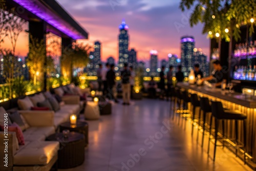 Blurred rooftop bar city skyline sunset luxury lounge nightlife urban background bokeh lights evening social terrace restaurant