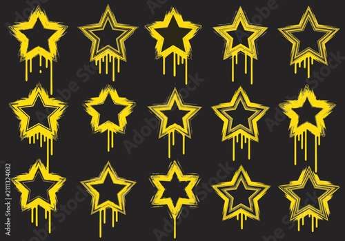 Yellow grunge star icons with dripping paint effect on transparent background, perfect for design elements, overlays and graphic accents.
