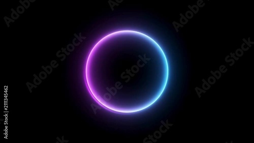 neon circle glows with a gradient of pink and blue light against a black background