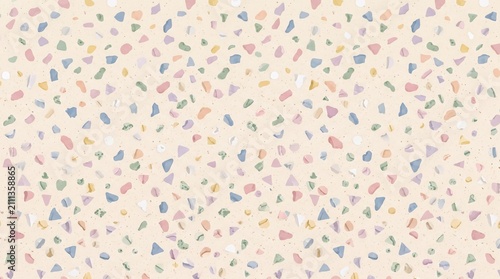 Seamless pastel terrazzo pattern with colorful stone chips on a cream background