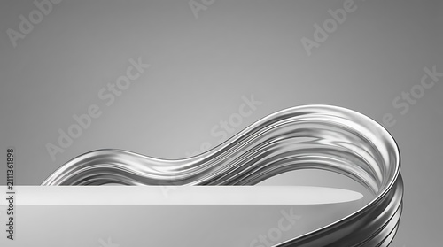 Chrome metal ribbon on white display pedestal.