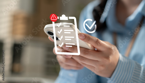 Obraz na płótnie Businesswoman checklist on smartphone with digital verification, task management, compliance, online approval, productivity workflow, mobile planning, reminder, quality control successful project