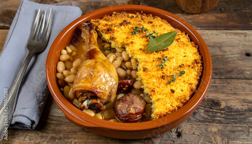 Hearty Baked Chicken and Bean Casserole with Sausage and Cheese.