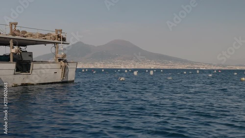 Floating buoys at a mussel farm in the Gulf of Naples, along the Mediterranean coast.