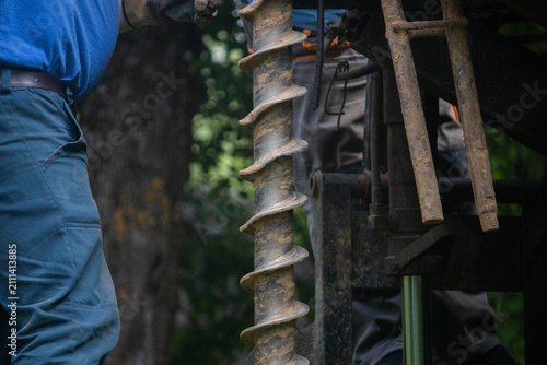 engineering geological surveys, environmental soil analysis, a drill drills into the soil	