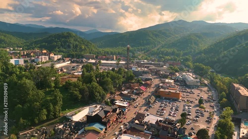 Gatlinburg, Tennessee. Popular resort town surrounded by Appalachian mountain hills, featuring the main Parkway lined with shops, restaurants, and tourist attractions.