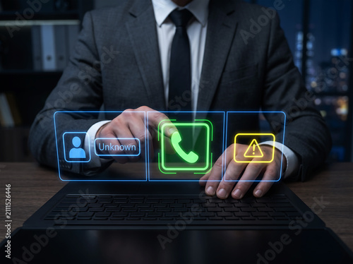 Digital customer support interface with business professional using laptop