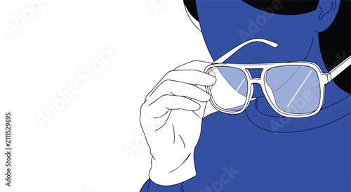 Woman adjusts stylish shades against a blue backdrop