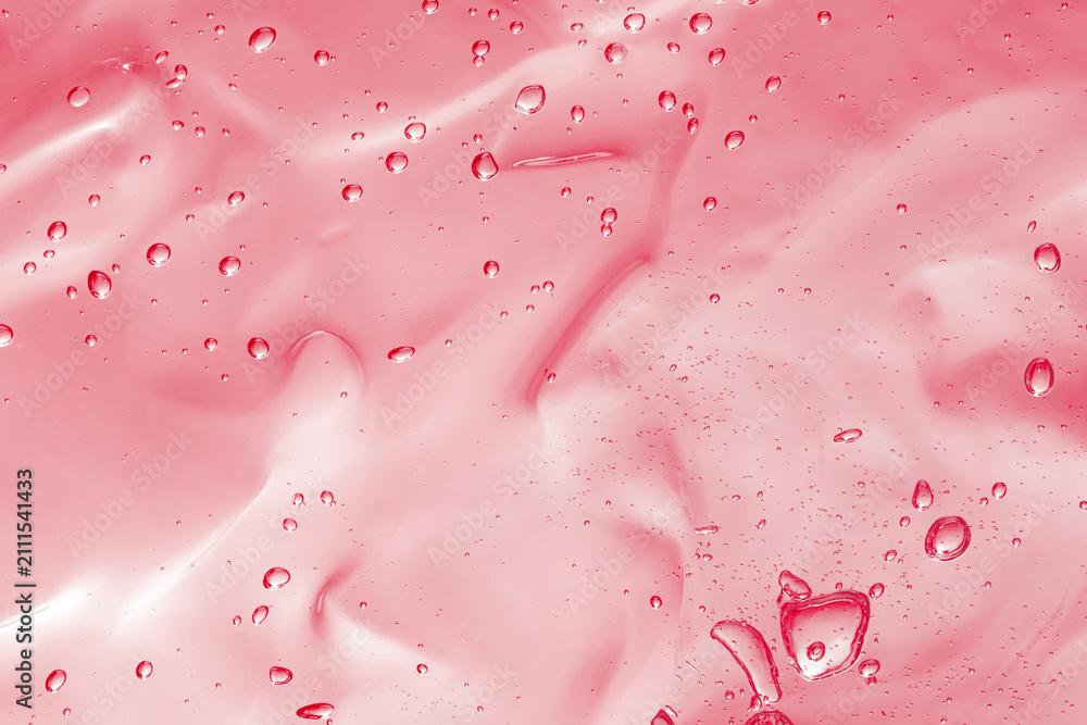Obraz premium Pink transparent cosmetic product as background, closeup