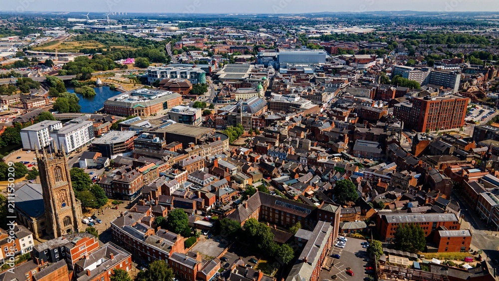Fototapeta premium Aerial drone view of historic Derby city center with cathedral tower
