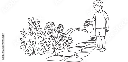 boy watering plants on stone path