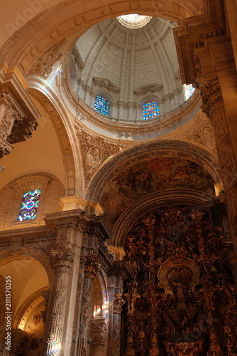 extremely intricate design and stained glass windows inside seville cathedral, the largest Gothic cathedral in the world