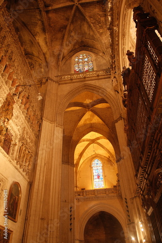 extremely intricate design and stained glass windows inside seville cathedral, the largest Gothic cathedral in the world