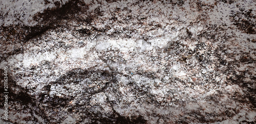 Quadro em tela Granite rock texture background with coarse crystalline mineral structure and na