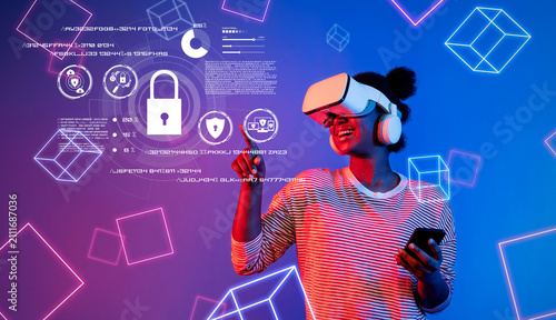 Photography A young woman joyfully interacts with virtual reality technology, immersing herself in cyber security concepts aimed at enhancing data protection and online privacy
