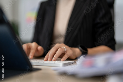 Photography Focused professional typing on keyboard