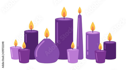 A collection of lit purple candles in various shapes and sizes