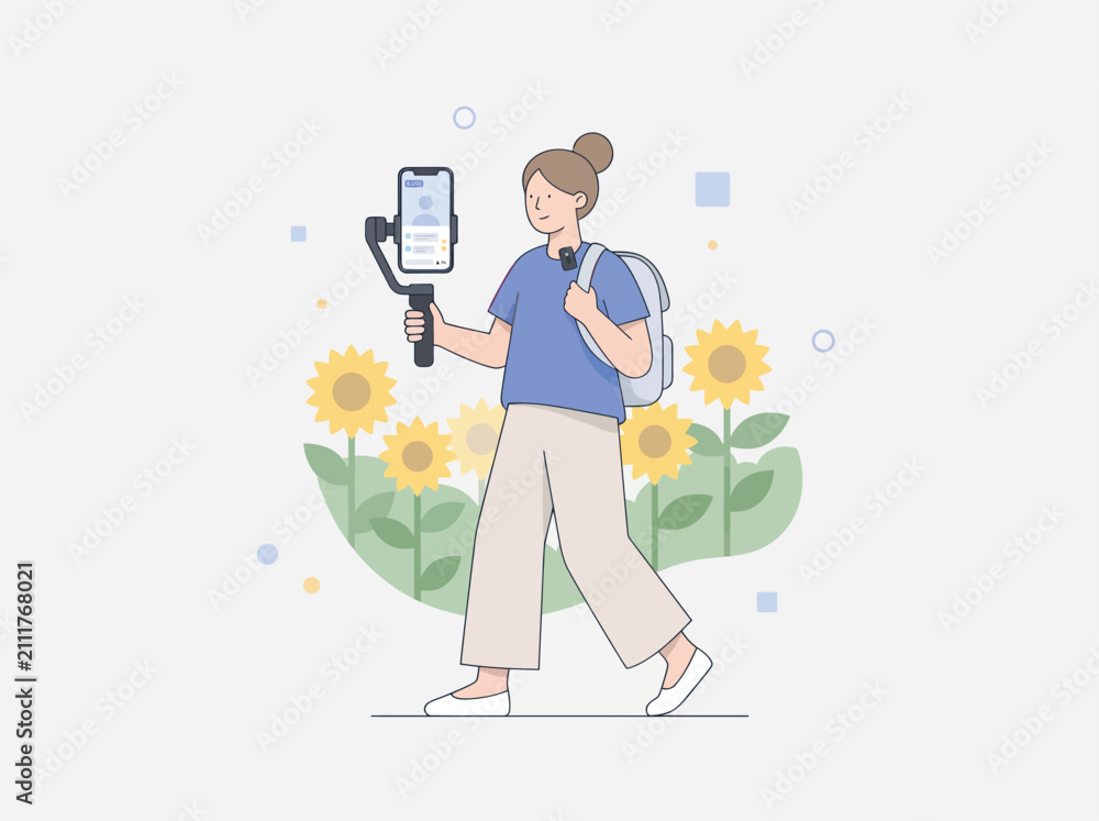 Fototapeta premium Young woman vlogging with smartphone gimbal and backpack while walking through sunflowers with happy mood