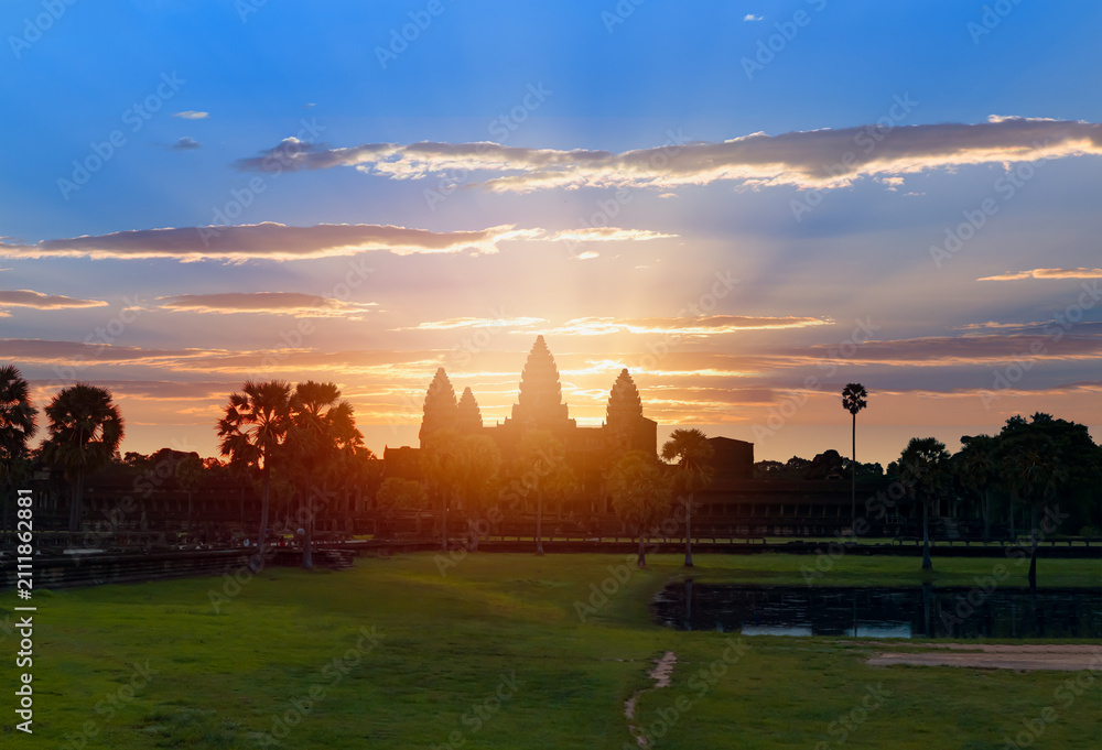 Fototapeta premium Sunrise view of popular tourist attraction ancient temple complex Angkor Wat - Siem Reap, Cambodia