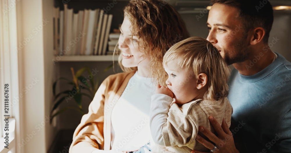 Fototapeta premium Window, smile and family in home for bonding together, connection and support with baby child. Mother, father and toddler in house with care, love and view with happy parents on weekend break